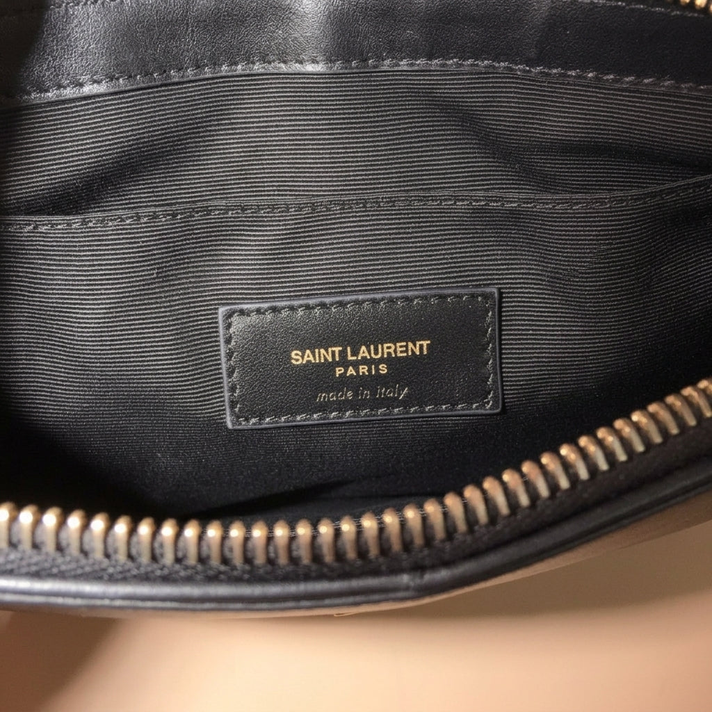 Saint Laurent Cassandre large zip pouch in black chevron-quilted leather
