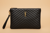 Saint Laurent Cassandre large zip pouch in black chevron-quilted leather